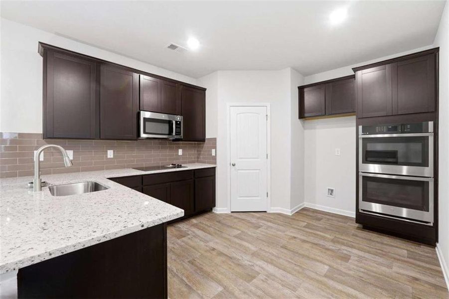 Furnished interior view inside a new home in , Covington (Image 2). Furnished interior view inside a new home in , Covington (Image 2).