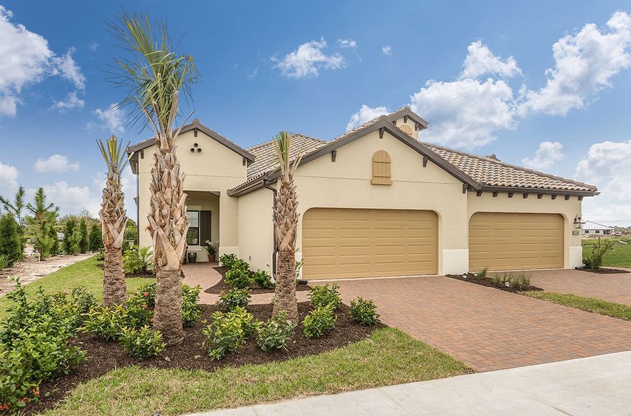 Representative exterior photo of a completed home built from the Sandcastle 2 by Neal Communities in Boca Royale Golf & Country Club at Wellen Park, Englewood, FL (Image 21).