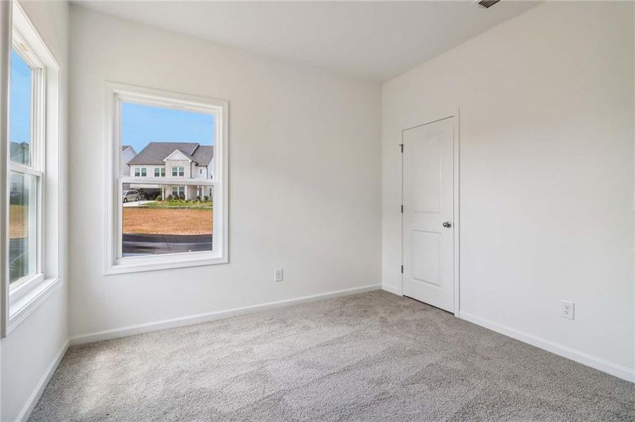 Spacious, unfurnished interior of a new home in Eastlyn Crossing, Flowery Branch (Image 23). Spacious, unfurnished interior of a new home in Eastlyn Crossing, Flowery Branch (Image 23).