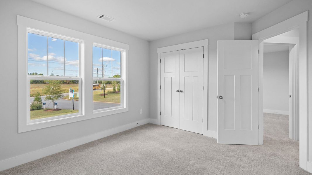 2 story single family home, all white, bedroom