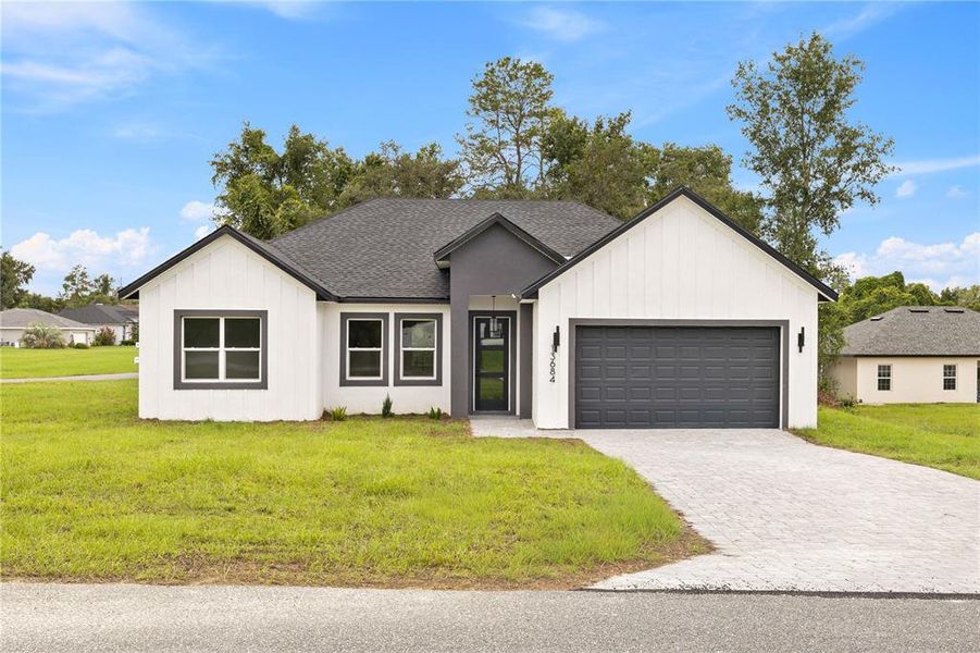 Front exterior of a new home in , Ocala, FL, highlighting curb appeal (Image 24). Front exterior of a new home in , Ocala, FL, highlighting curb appeal (Image 24).