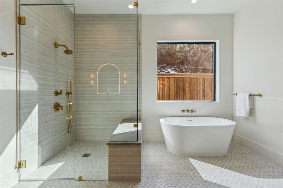 Bathroom featuring separate shower and tub and tile patterned flooring