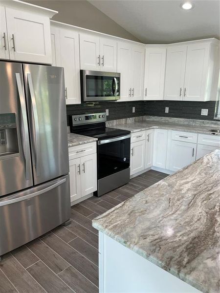 Furnished interior view inside a new home in , Port Charlotte (Image 8).