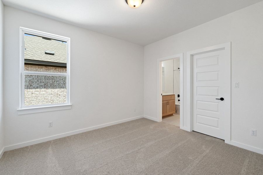 Spacious, unfurnished interior of a new home in Heritage, Dripping Springs (Image 50).