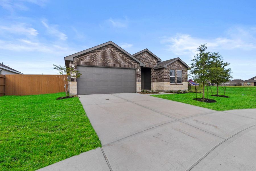 Front exterior of a new home in , Dayton, TX, highlighting curb appeal (Image 18). Front exterior of a new home in , Dayton, TX, highlighting curb appeal (Image 18).