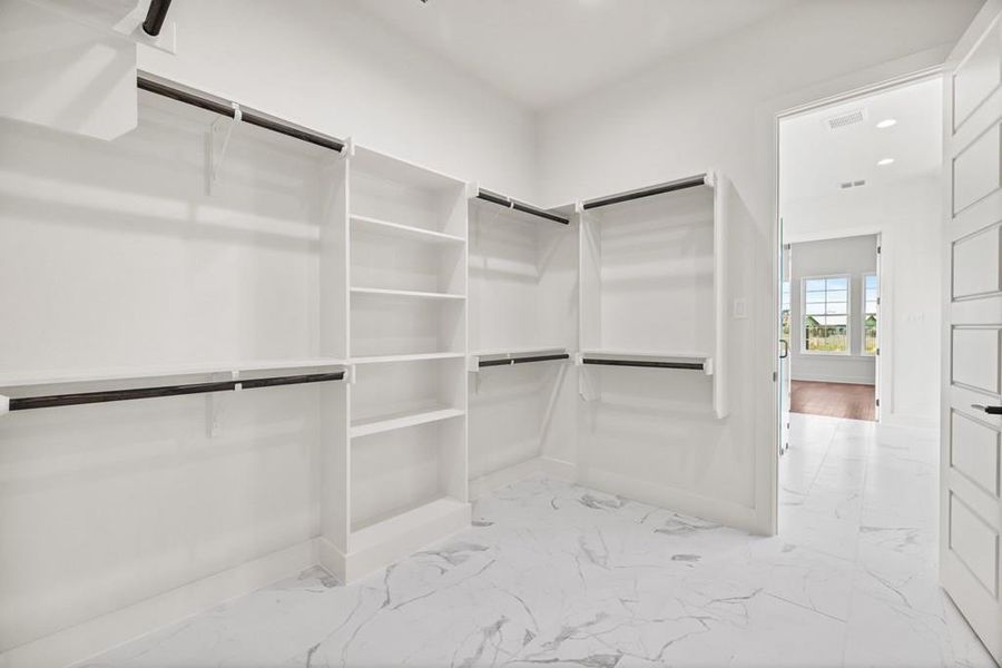Primary bedroom walk in closet Primary bedroom walk in closet