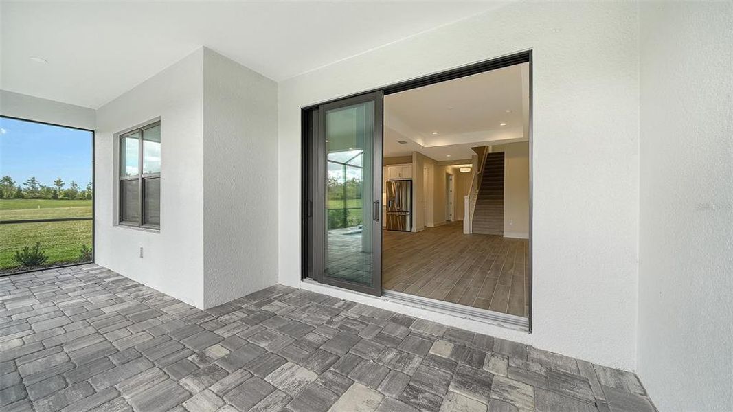 Exterior details and patio area of a home in Palm Grove, Lakewood Ranch (Image 4).