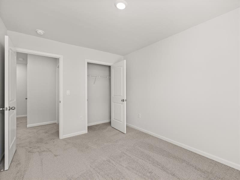 Spacious, unfurnished interior of a new home in Waypoint, Flowery Branch (Image 28).