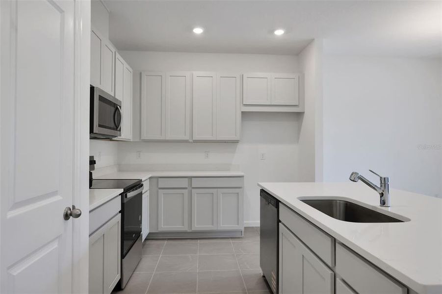 Furnished interior view inside a new home in Seaport Village, Tavares (Image 7).