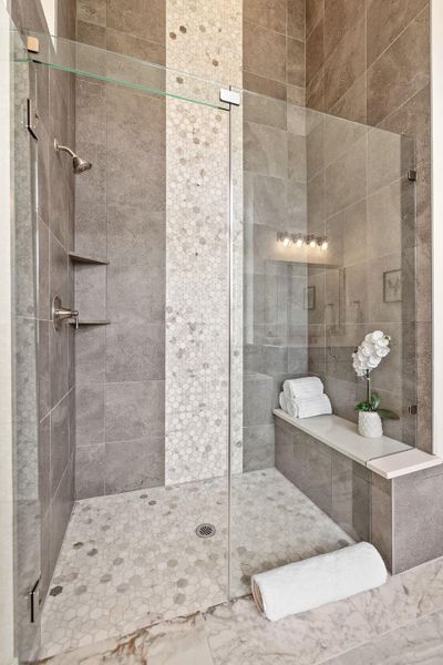 Full bath with a shower stall