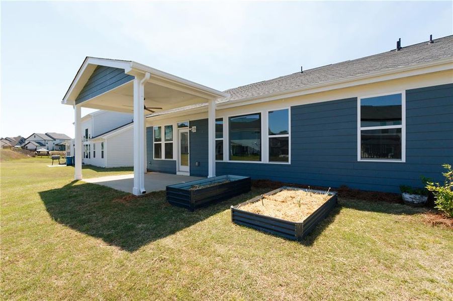 Exterior details and patio area of a home in Sweetbay Farm, Lawrenceville (Image 32).