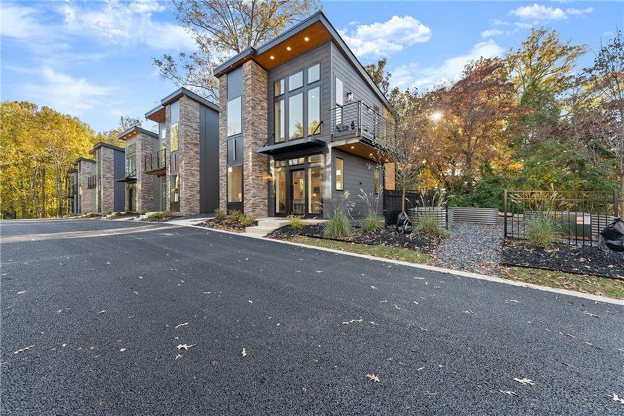 Front exterior of a new home in Villa Nova, Gainesville, GA, highlighting curb appeal (Image 20).