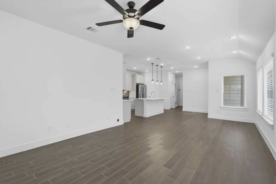 Representative unfurnished interior of a home built from the Carriagehouse by Chesmar Homes in Meridiana Townhomes, Iowa Colony (Image 97).