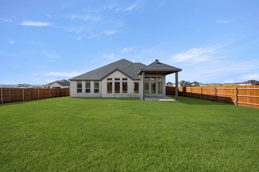 Exterior details and patio area of a home in Bull Hide Estates, Hewitt (Image 28).