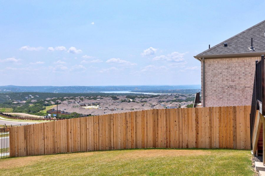 Exterior details and patio area of a home in Lakeside at Tessera, Lago Vista (Image 25).