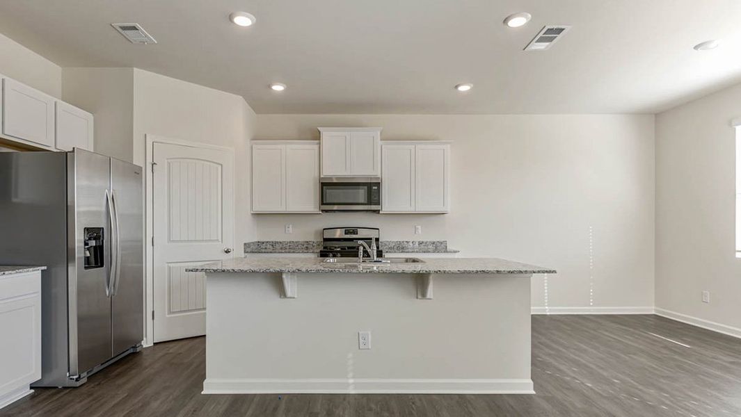 Representative furnished interior of a home built from the Darwin by D.R. Horton in Sherwood Manor, College Park (Image 3).