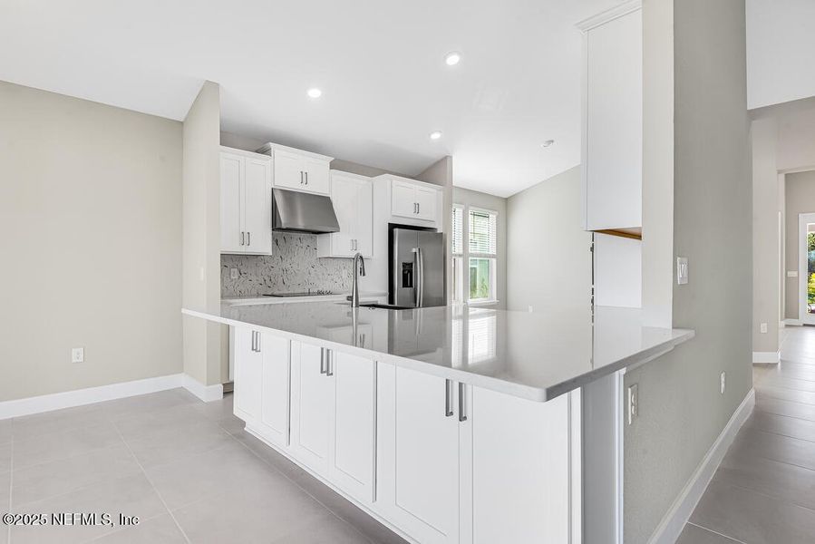 Furnished interior view inside a new home in Colbert Landings, Palm Coast (Image 32).