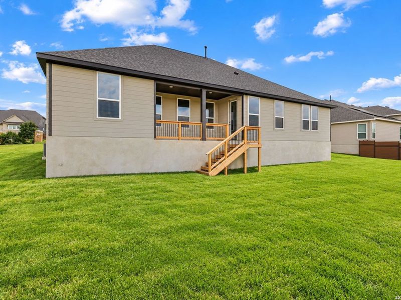 Exterior details and patio area of a home in Potranco Oaks, Castroville (Image 29).