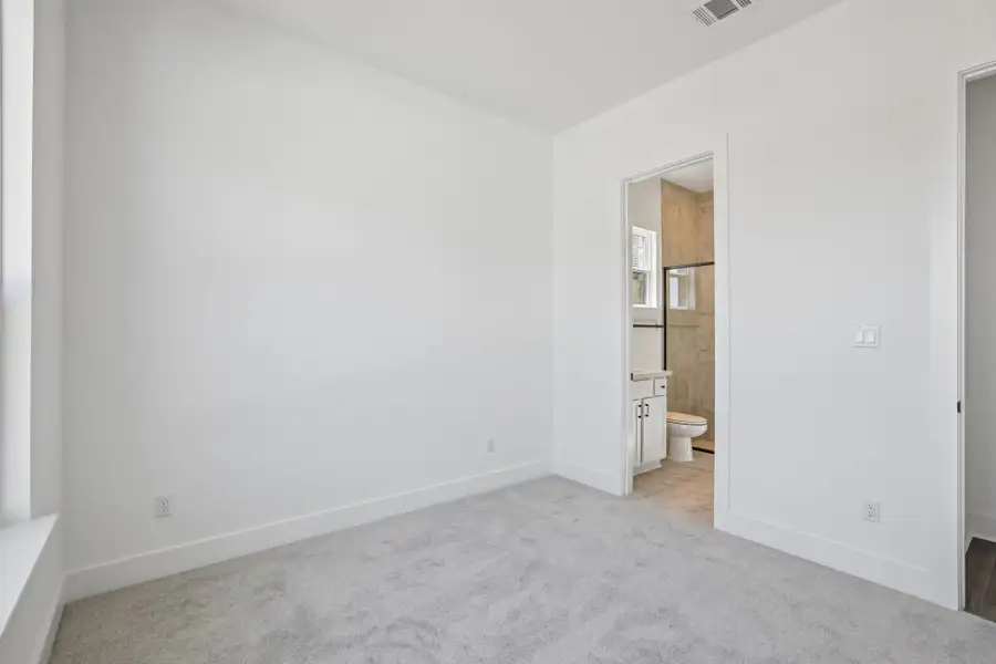 Representative unfurnished interior of a home built from the Anderson by Taylor Morrison in Easton Park, Austin (Image 35).