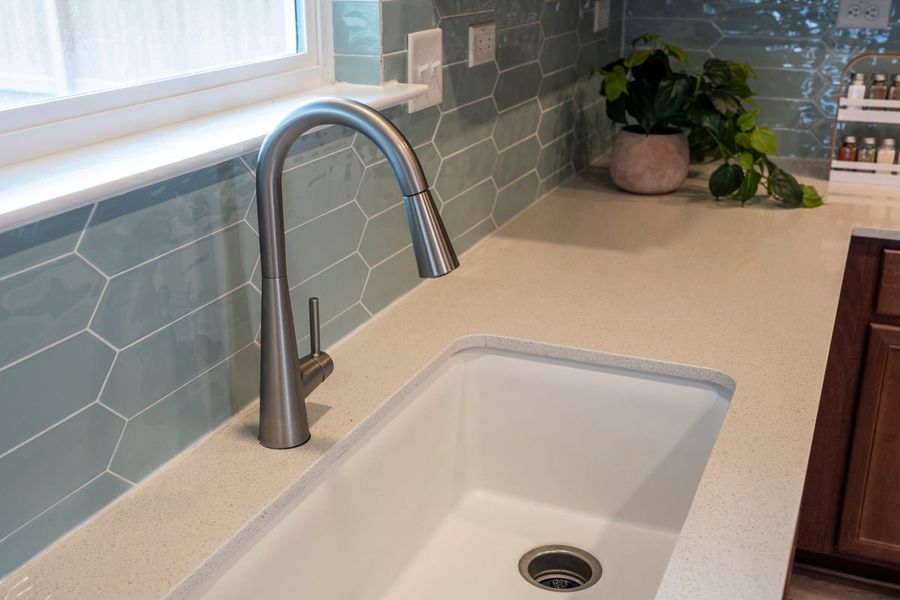 High-arc kitchen faucet and undermount sink High-arc kitchen faucet and undermount sink