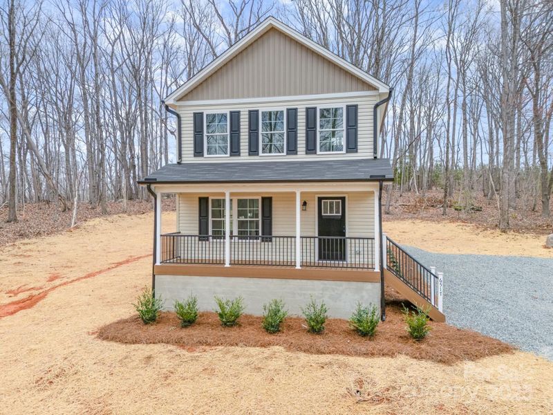 Front exterior of a new home in , Troy, NC, highlighting curb appeal (Image 17).