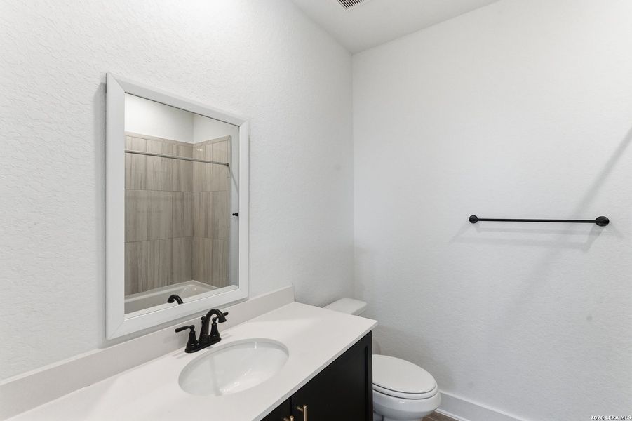Furnished interior view inside a new home in Rose Hill, San Antonio (Image 13).