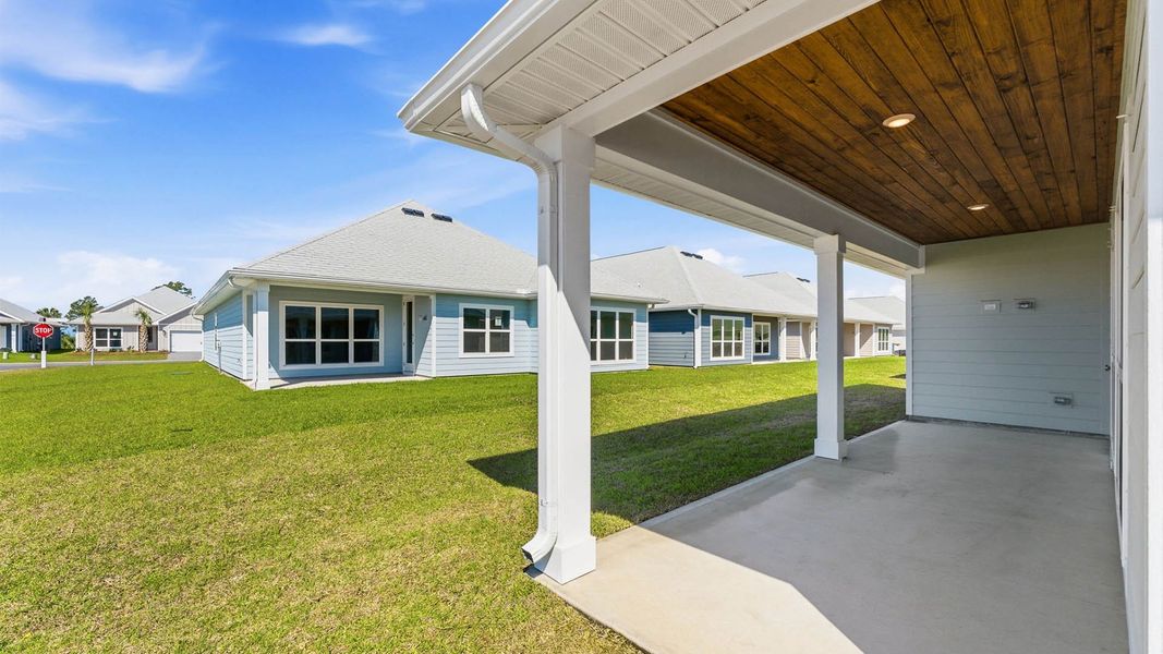 Exterior details and patio area of a home in WindMark Beach, Port Saint Joe (Image 20).