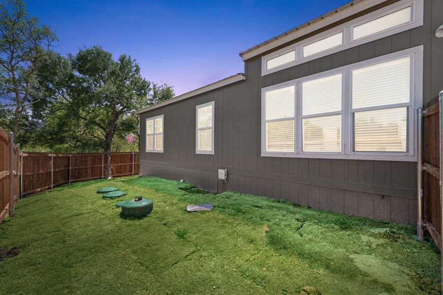 Exterior details and patio area of a home in , Granbury (Image 21).