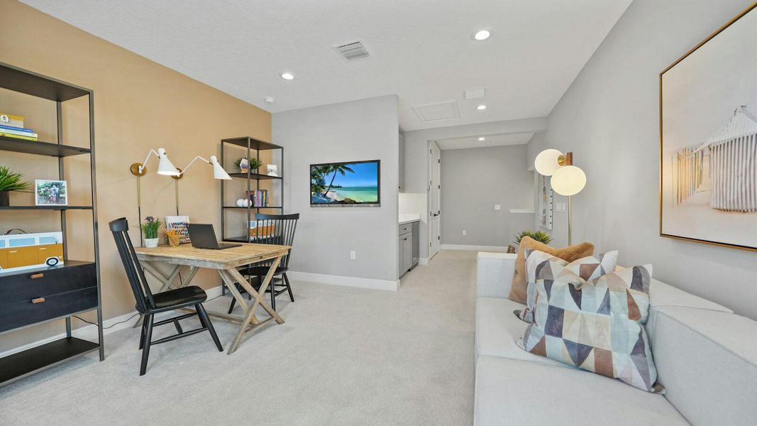 Furnished interior view inside a new home in Wildleaf Real Estate and Homes for Sale in Parrish, FL - Neal Communities, Parrish (Image 22).