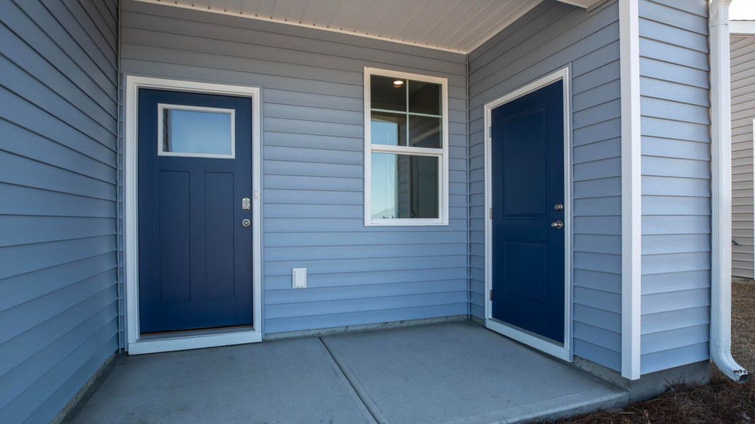 Representative exterior photo of a completed home built from the DELANEY by D.R. Horton in The Cottages at Blake Farm, Wilmington, NC (Image 3). Representative exterior photo of a completed home built from the DELANEY by D.R. Horton in The Cottages at Blake Farm, Wilmington, NC (Image 3).