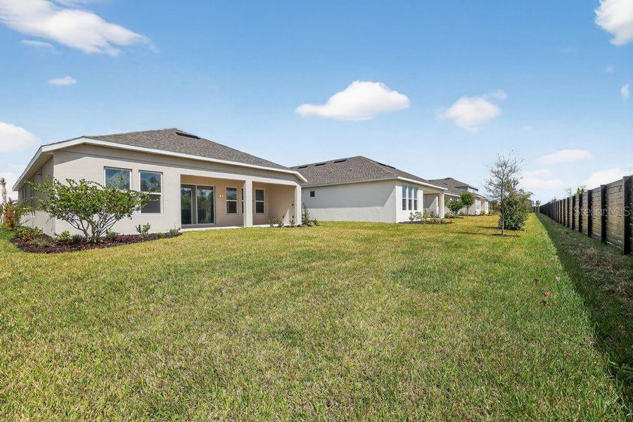 Exterior details and patio area of a home in Firethorn, Parrish (Image 4).