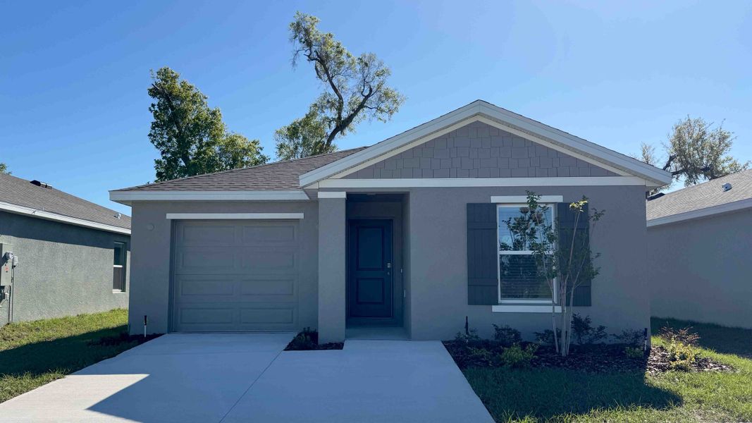 Representative exterior photo of a completed home built from the Cameron by D.R. Horton in Somerset Bay, Spring Hill, FL (Image 1). Representative exterior photo of a completed home built from the Cameron by D.R. Horton in Somerset Bay, Spring Hill, FL (Image 1).