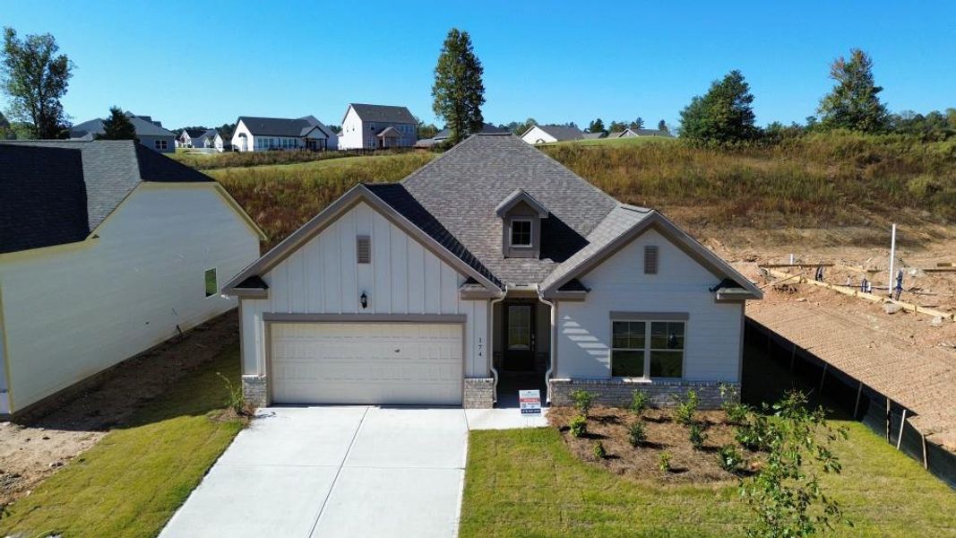 Front exterior of a new home in , Homer, GA, highlighting curb appeal (Image 2).