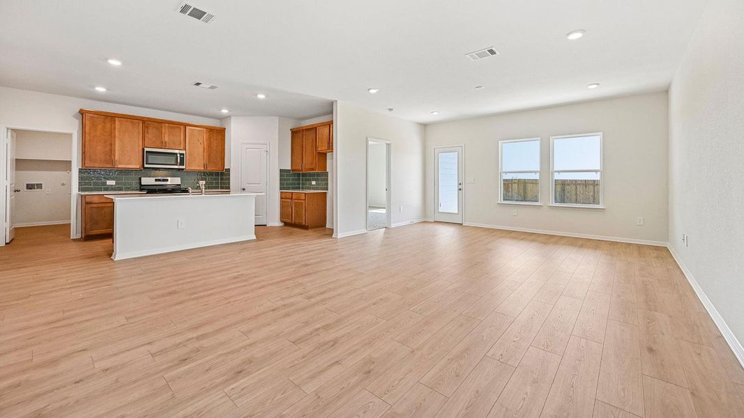 Spacious, unfurnished interior of a new home in Carillon, Manor (Image 29).