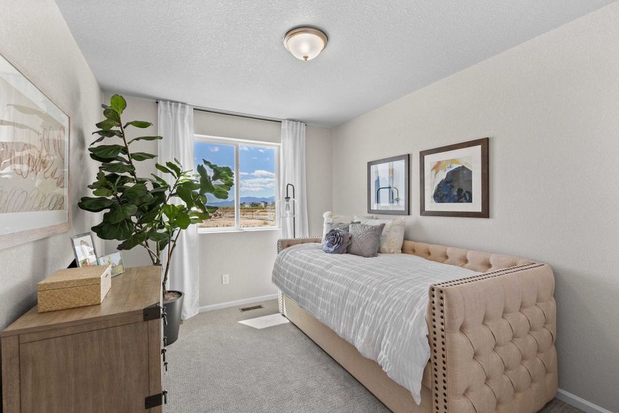 Furnished interior view inside a new home in Green Valley Ranch, Aurora (Image 18).