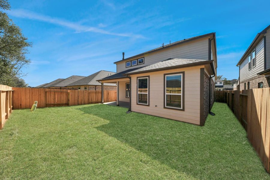 Backyard retreat, offering an abundance of space for kids to play and explore. The possibilities are endless in this outdoor haven, where the joy of open-air activities and family gatherings awaits.