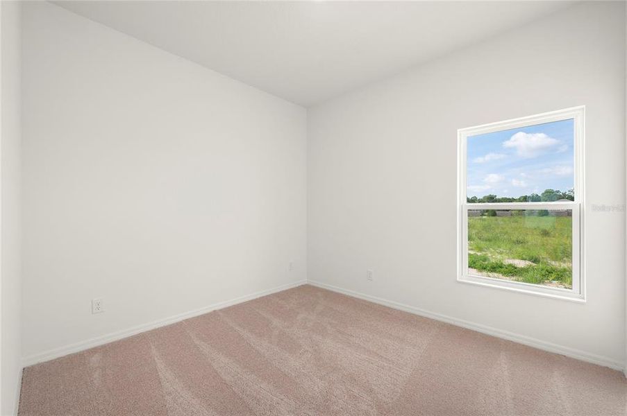 Spacious, unfurnished interior of a new home in Gum Lake Preserve, Lake Alfred (Image 17).
