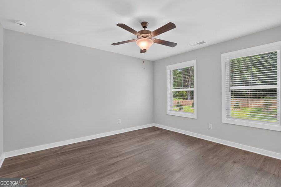 Spacious, unfurnished interior of a new home in The Cottages at East Lanier, Fayetteville (Image 12).