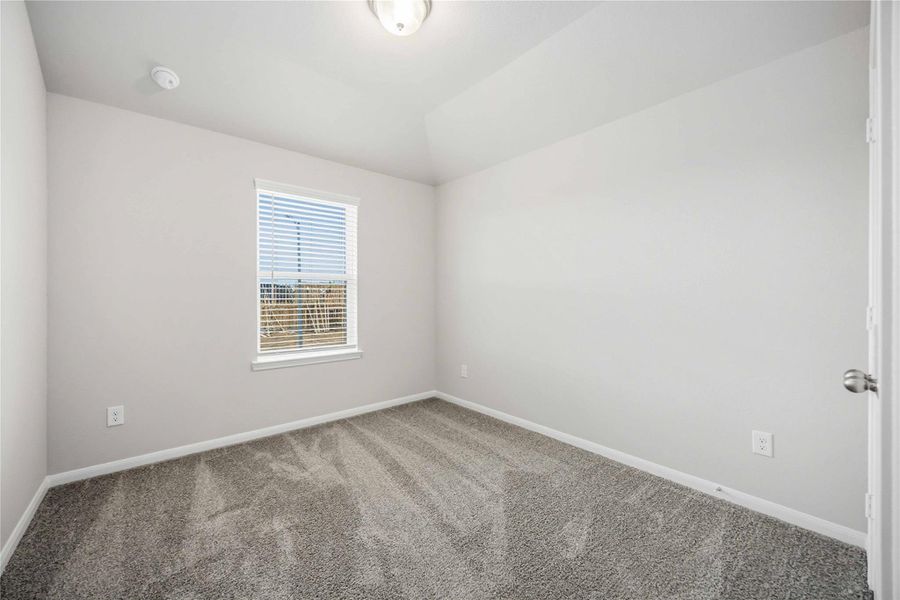 Spacious, unfurnished interior of a new home in Sunterra, Katy (Image 20).