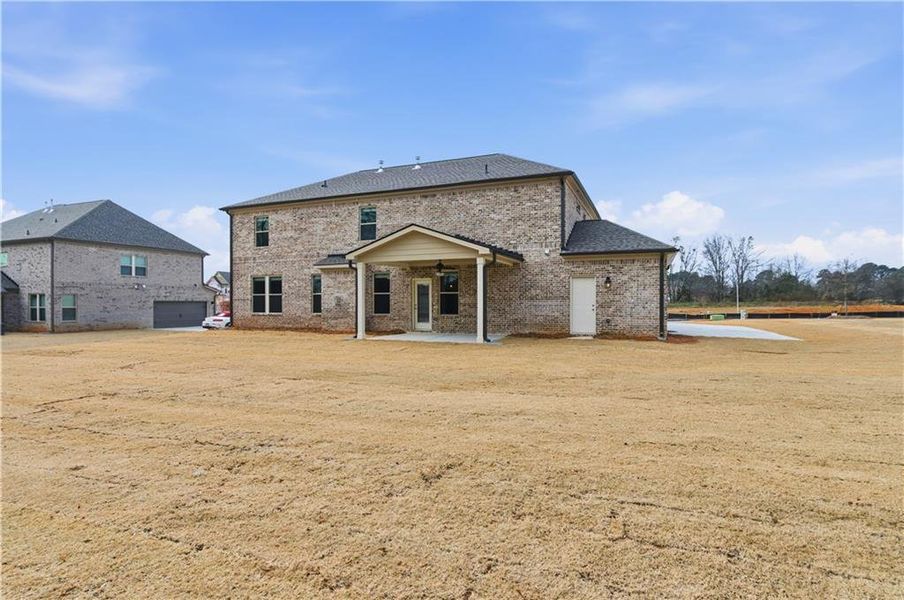 Exterior details and patio area of a home in Cambria at Traditions, Hampton (Image 4).