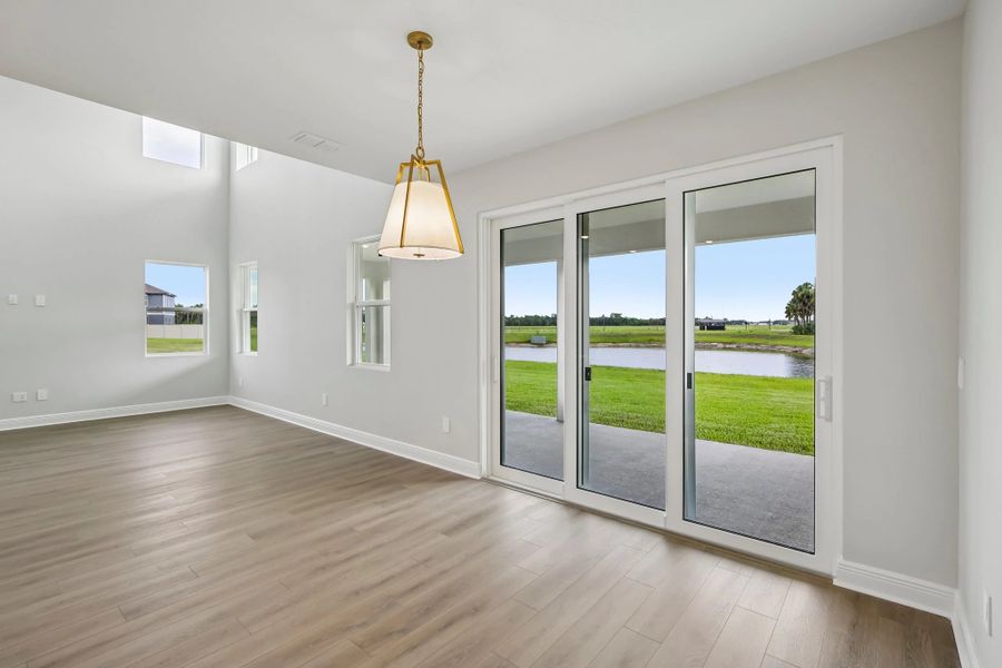 Dining nook between the kitchen and the covered lanai makes the perfect space for entertaining