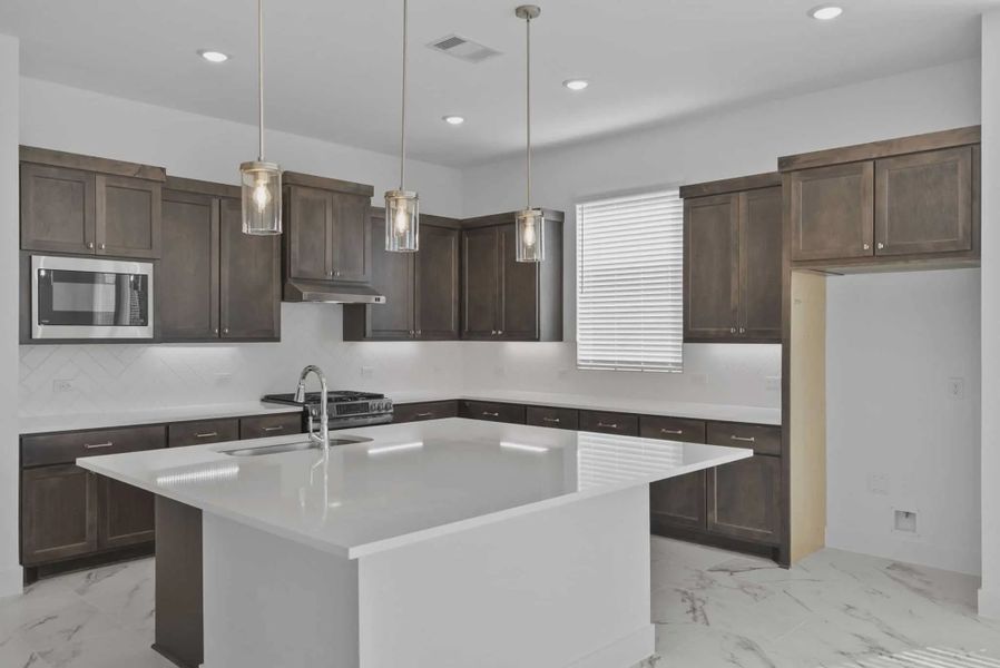 Representative furnished interior of a home built from the Nicklaus by Chesmar Homes in Riceland Alley Loads, Mont Belvieu (Image 39).