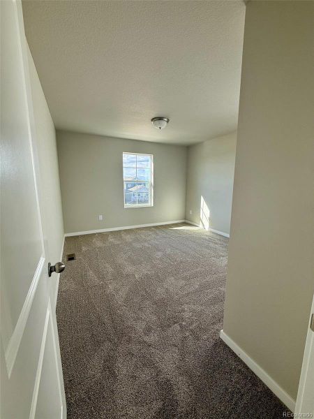 Spacious, unfurnished interior of a new home in Sky Ranch – Uptown Collection, Watkins (Image 16).