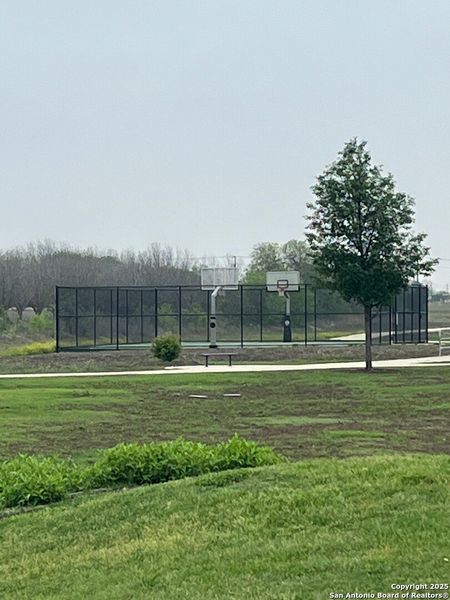 Front exterior of a new home in August Fields, New Braunfels, TX, highlighting curb appeal (Image 20). Front exterior of a new home in August Fields, New Braunfels, TX, highlighting curb appeal (Image 20).