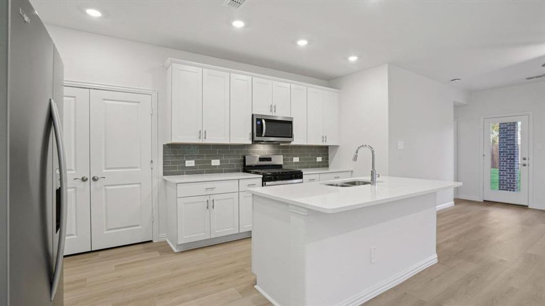 Photo is not of the actual home, but is an inspirational photo of builder’s model home and may depict options, furnishings, and/or decorator features that are not included.