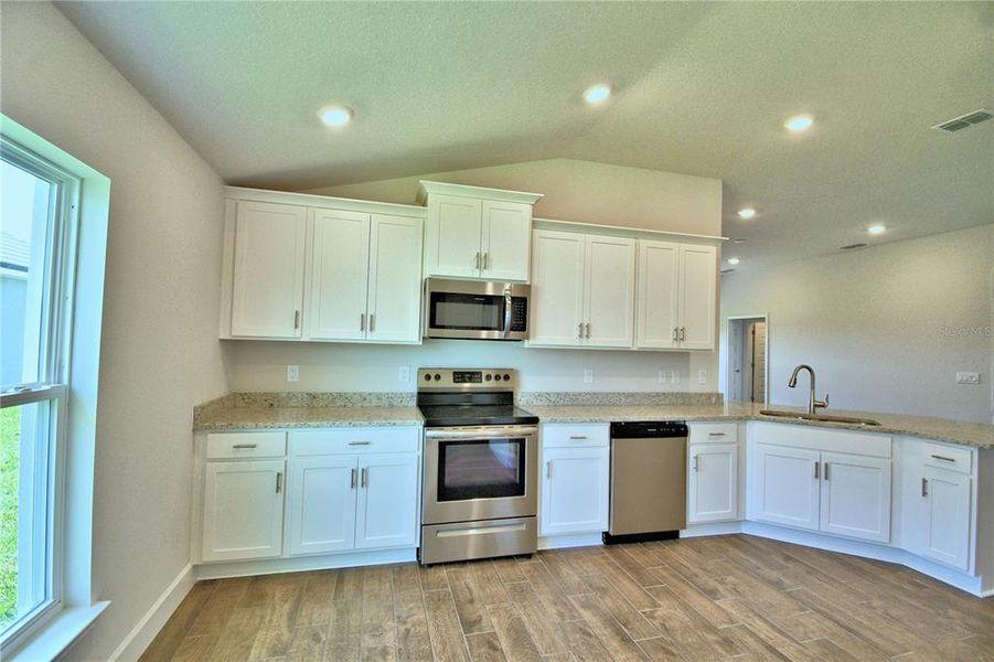 Furnished interior view inside a new home in , Auburndale (Image 13).
