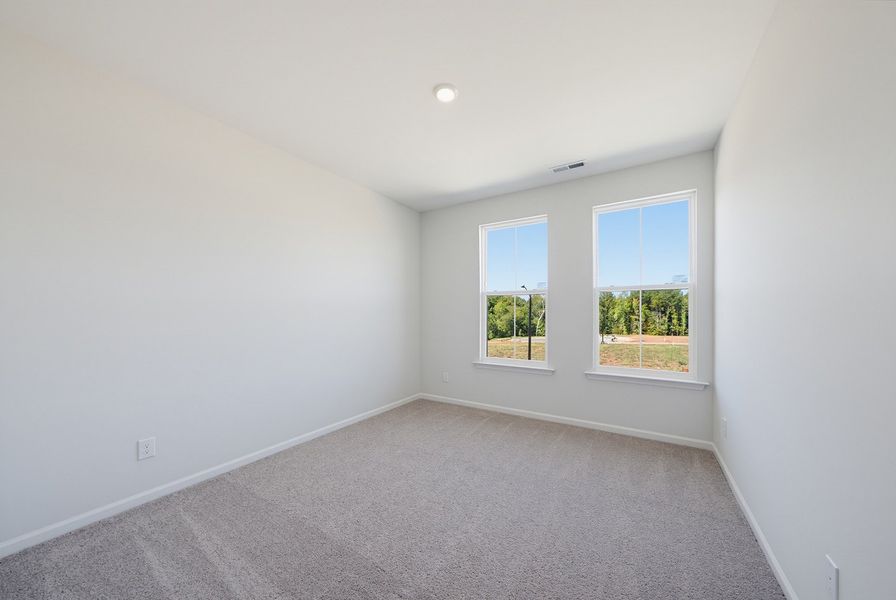 Spacious, unfurnished interior of a new home in Sweetbrier, Durham (Image 24).