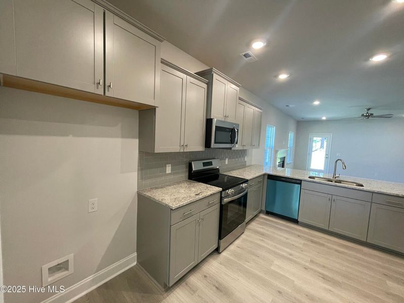 Furnished interior view inside a new home in Mill Creek Cove, Bolivia (Image 4). Furnished interior view inside a new home in Mill Creek Cove, Bolivia (Image 4).