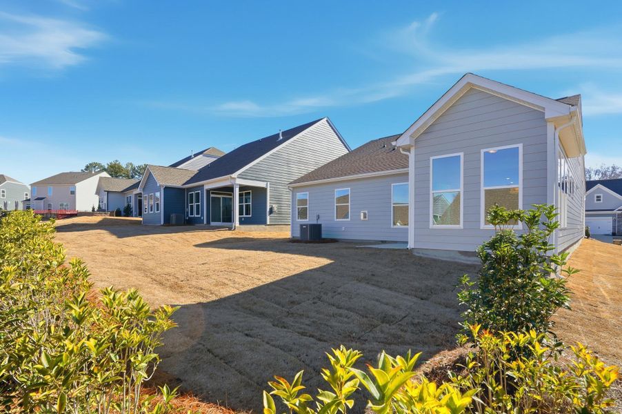 Exterior details and patio area of a home in Villas at Prestwick, Mooresville (Image 34).
