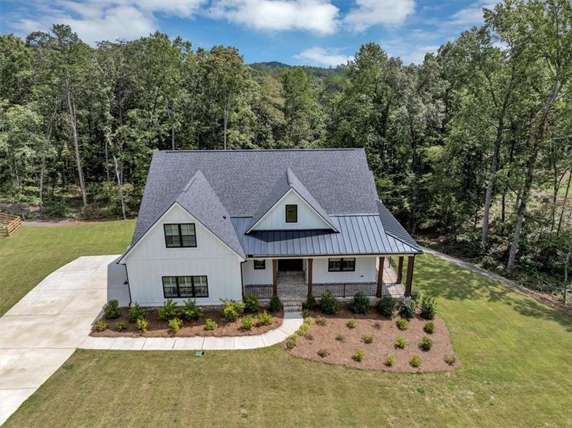 Front exterior of a new home in , Ball Ground, GA, highlighting curb appeal (Image 23).